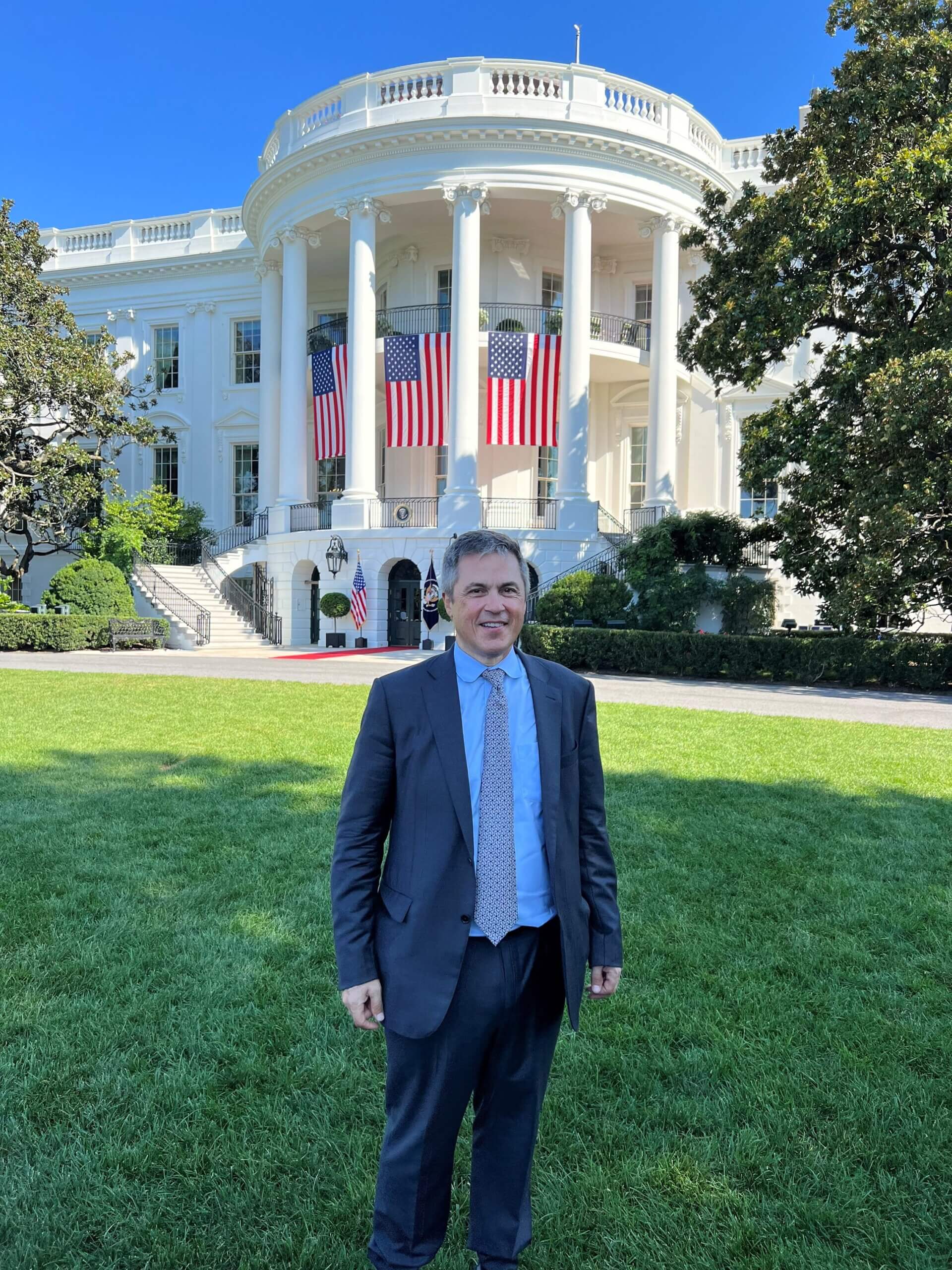 Rick Wallace at the signing of the CHIPS and Science Act 2022