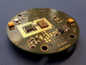 Figure 3: A built-up radar sensor with a glass package in the center and attached dielectric waveguide