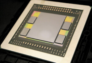 "AMD Fiji GPU package with GPU, HBM memory and interposer" (Image ny Kapitaenk - Own work. Licensed under Public Domain via Wikimedia Commons)