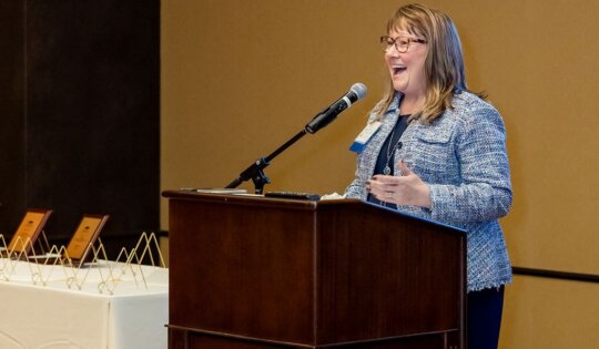 Dawn Roller accepts NYCCT partnership award.