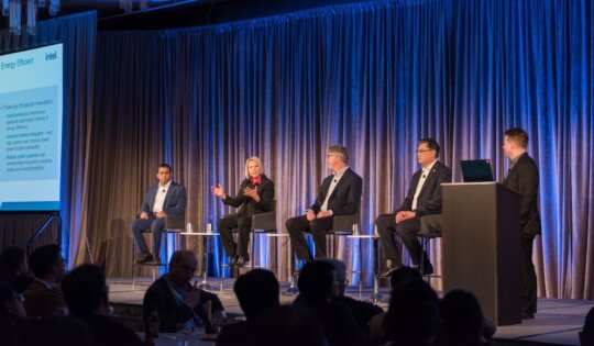 Figure 4 Feature photo above: Ian Cutress of More than Moore moderated a panel discussion including Terrence Lee of Applied Materials, Johanna Swan of Intel, Deepak Kulkarni of AMD, and Kam Kittrell of Cadence. (Source Applied Materials).