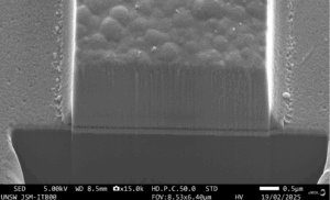 Figure 4. A FIB cross-section of 5um width trace that was fabricated with LEM on Si with a thin Ti/Cu seed layer.